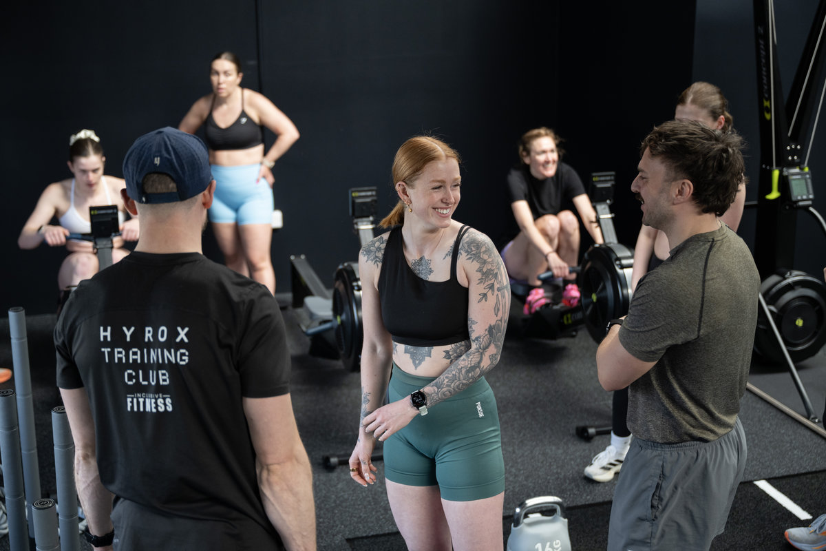 Diverse community members working out together and connecting at Inclusive Fitness